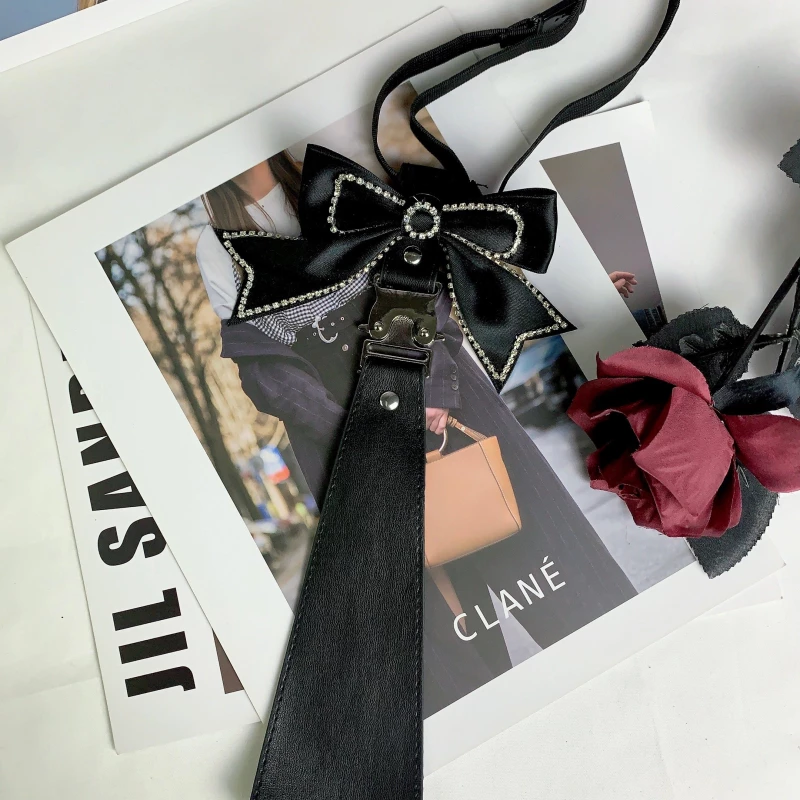 Women's Faux Leather Tie with Rhinestone Bow Accent